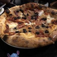 The Alki Pizza · A tribute to our beachfront location for 22 years, this pizza features spicy salami, caramel...