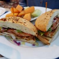 Blackened Chicken Sandwich · Seared blackened chicken on foccacia bread with avocado, lettuce, tomato, red onion and garl...