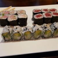 Maki Combo · California roll, yellowtail scallion roll and tuna roll. Served with choice of green salad o...