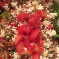 Quinoa Salad · Organic white quinoa mixed with bell peppers and crumbled feta cheese over red leaf lettuce ...