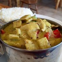 Green Curry · Rice with eggplants, bamboo shoots, bell peppers and basil. Spicy.