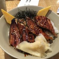 Unagi Don · BBQ eel over rice. Served with miso soup, salad and rice.
