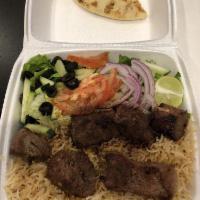 Tikka Kabob · Chunks of tender beef marinated 48 hours prior with homemade spices. Served with rice and sa...