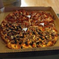 Snowy Alps · Garlic Combo. Piled high with pepperoni, mushrooms, olives, Italian sausage, green onions an...