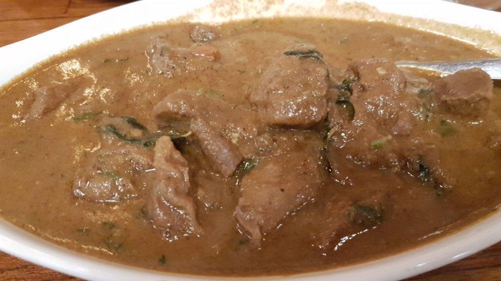 Lamb Curry · Boneless lamb cubes cooked in traditional South Indian curry.