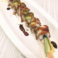 Dragon Roll · Shrimp tempura, cucumber, topped with eel and avocado. Served raw.