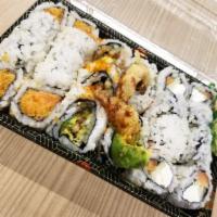 Spider Roll · Soft shell crab tempura, cucumber and avocado inside,on top tobiko and eel sauce