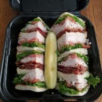 Ol Reliable Turkey Club · Oven roasted turkey breast, Applewood smoked bacon, lettuce, tomato and mayonnaise on 3 piec...