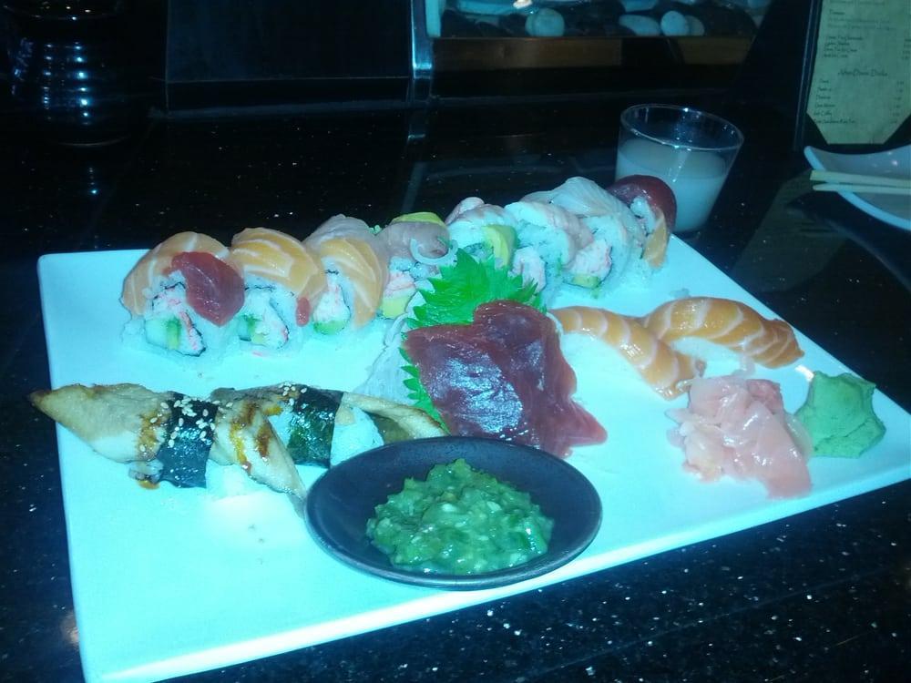 8 Piece Rainbow Roll · Assortment of sushi.