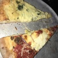 Staten Island Pizza · Meatballs, cooked tomato sauce, red onion, mozzarella, Parmigiano Reggiano and ricotta.