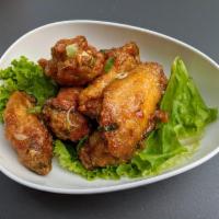 Vietnamese Wings · Canh ga chien nuoc mam. Crispy chicken wings fried with house-made sweet garlic fish sauce.