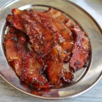 Crack Bacon · 5 pieces of our house crack bacon made with brown sugar and black pepper.