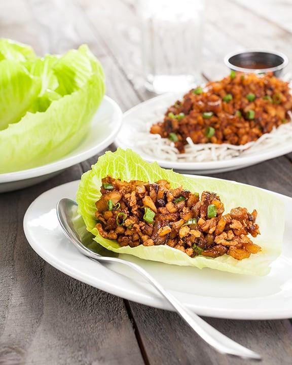 Chicken Lettuce Wraps · Minced chicken, mushrooms, scallions, and garlic and Asian slaw. Served with romaine lettuce cups and ponzu sauce.