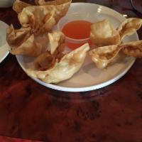 Crab Rangoon · 6 pieces. Fried wonton wrapper filled with crab and cream cheese.