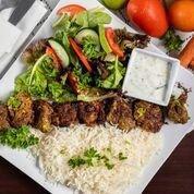 Lamb Kabob · Lamb marinated in imported spices and grilled. Served with rice, salad and pita bread.