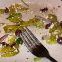 Greek Salad · Romaine, organic spinach, bibb lettuce, red onions, Kalamata olives, tomatoes, Persian cucum...