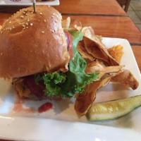 Baja Burger · Buffalo sauce, cheddar cheese, applewood bacon, lettuce, tomato and mayo.