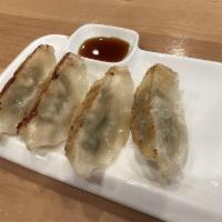 Gyoza · 6 pieces. Pan-fried chicken potstickers. Served with gyoza sauce.