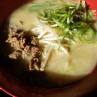 Oxtail Ramen · Oxtail bone marrow based soup; topped with marinated halal beef, onion, scallions and bean s...