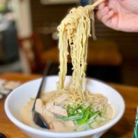 Chicken Ramen · Chicken broth based soup. Topped with 4 pieces seasoned marinated chicken, onion, scallion a...