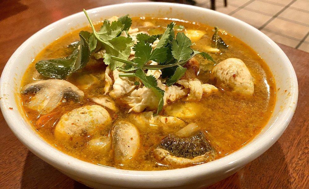 Tom Yum Noodle Soup · Choice of chicken and shrimp OR seafood combo with thin rice noodles, fresh mushroom, tomato, cauliflower, lemongrass, cilantro in tom-yum broth (hot and sour).