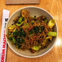 Sing Chow Men · Rustic yellow curry sauce, vermicelli rice noodle, cabbage, scallion, carrot, onion, mushroo...