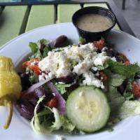 Greek Salad · Mixed greens, Kalamata olives, cucumbers, tomatoes, red onions, pepperoncini and feta cheese...