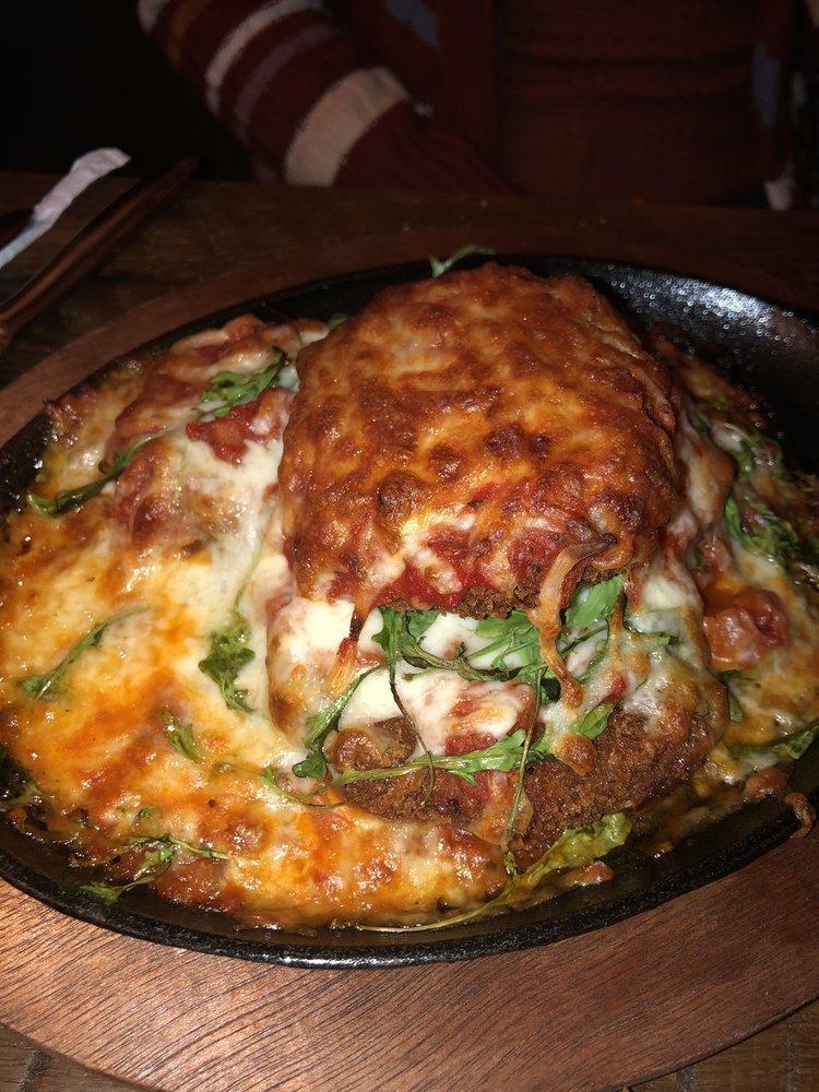 Eggplant Lasagna · Hand breaded, layered with house marinara, 3 cheese blend and arugula. Served with a salad.