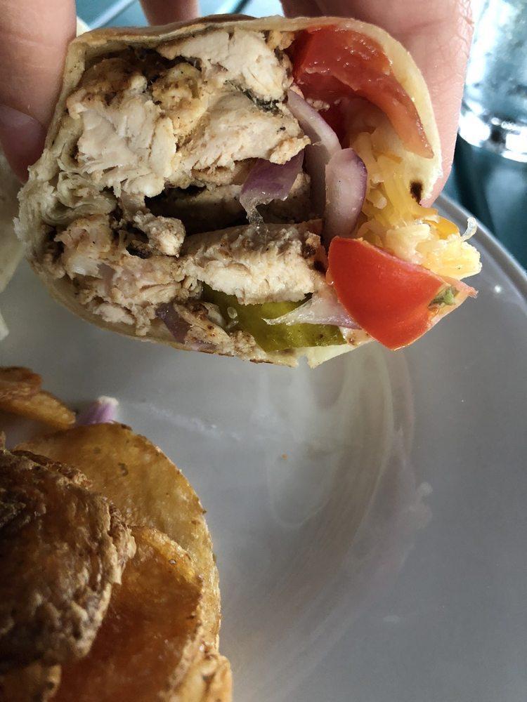 Marinated Grilled Chicken Panini · Marinated grilled chicken, smoked gouda, red onions, lettuce and tomatoes.