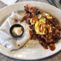 Hashita · This is our corned beef hash fajita. We top your grilled hash with cheddar cheese, tomatoes,...
