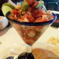 Ceviche · Fresh white fish and shrimp cooked in fresh lime juice and tossed with cilantro, diced tomat...