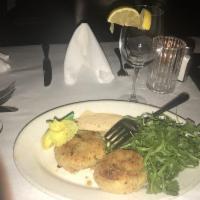 Crab Cakes · Jalopeno remoulade and spring mix.