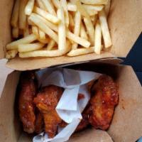 6 Wings Combo · 6 Classic or Boneless wings with up to 2 flavors, a side and a drink
