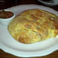 Sante Fe Omelette · Served with a medley of fresh onions, cilantro, tomatoes and jalapeno peppers with jalapeno ...