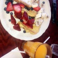 San Diego French Toast · Grilled until golden brown and garnished with the freshest sliced bananas, strawberries and ...