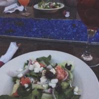 Greek Salad · Lettuce, tomatoes, cucumbers, onions, feta cheese, olives, lemon-olive oil vinaigrette. Glut...