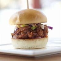 Carolina Babe Slider · Pulled pork, house-made BBQ sauce, caramelized onions and crisp coleslaw on an artisan white...