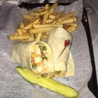 Southwest Chicken Wrap · Grilled chicken breast sauteed with jalapeno peppers, onions and bell peppers, Cajun spice s...