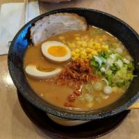 Miso Ramen · Egg noodle in a miso based rich pork broth with tender braised pork, soft boiled egg, scalli...