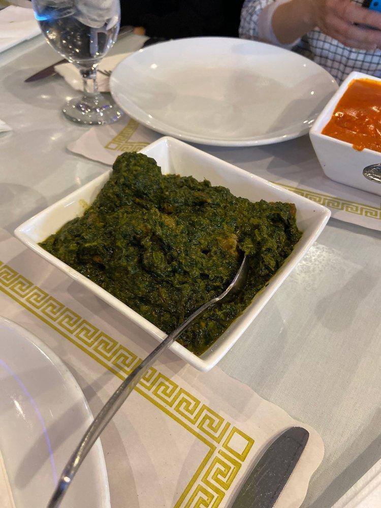 Lamb Saag · Tender lamb pieces cooked with chopped spinach, onion, ginger, garlic and spices with a touch of cream. Served with basmati rice.