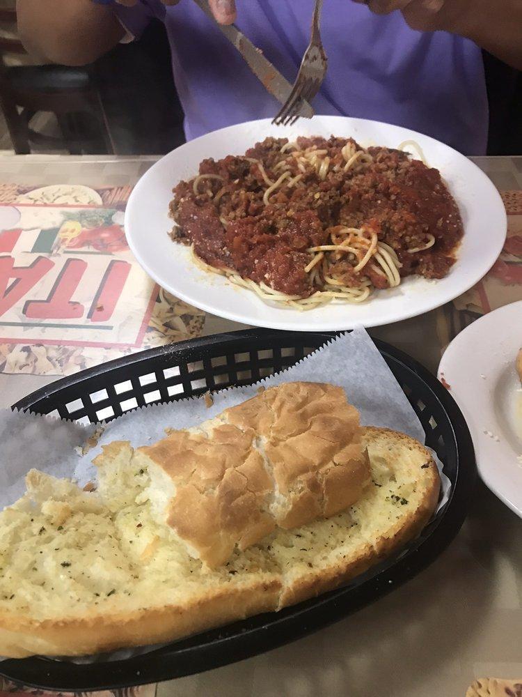 Spaghetti · Served with tossed salad and garlic bread.