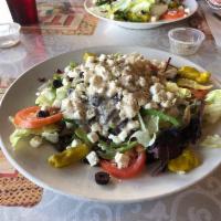 Greek Salad · Lettuce, tomato, onions, feta cheese, Greek olives and pepperoni. 