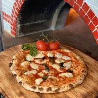 Margherita Pizza · Tomato sauce, fresh mozzarella, basil.