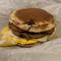 Yahoo Sandwich · A freshly fried egg, crispy hash-brown, cheese, and your choice of meat on a toasted Portugu...