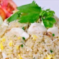 Crab Meat Fried Rice · Stir-fried rice with egg, scallion and onion. 