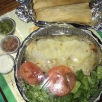 Tamales · 1 piece. A Mexican dish made of cornmeal dough wrapped in a corn husk and steamed filled wit...