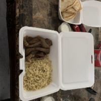 Gyro Plate · Layers of thinly sliced gyros from our rotisserie served with rice or fries, pita and small ...