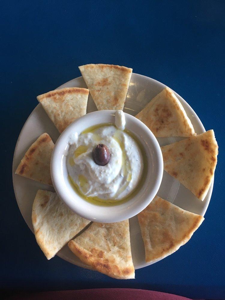 Tzatziki · A dip of Yogurt, cucumbers and garlic served with pita.