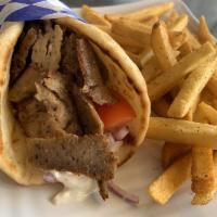 Gyro Sandwich · Gyro meat wrapped in a pita with tomatoes, red onions and tzatziki sauce.
