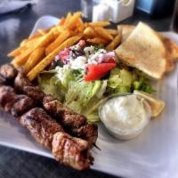 Pork Souvlaki Plate · 2 skewers of marinated and grilled pork  served with rice or fries, pita and small Athenian ...